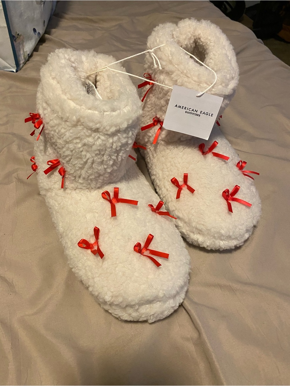 American Eagle Outfitters White Sherpa Bootie Slippers with Red Bows